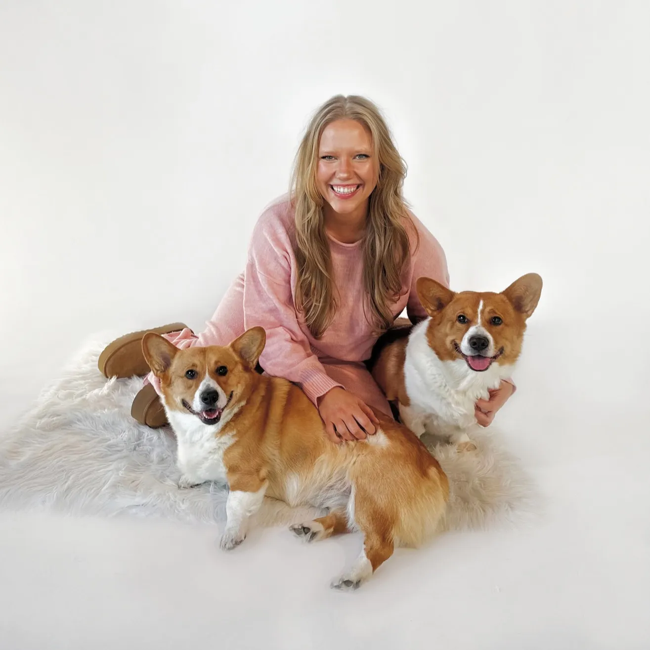 Ashley Storck with Her Corgis